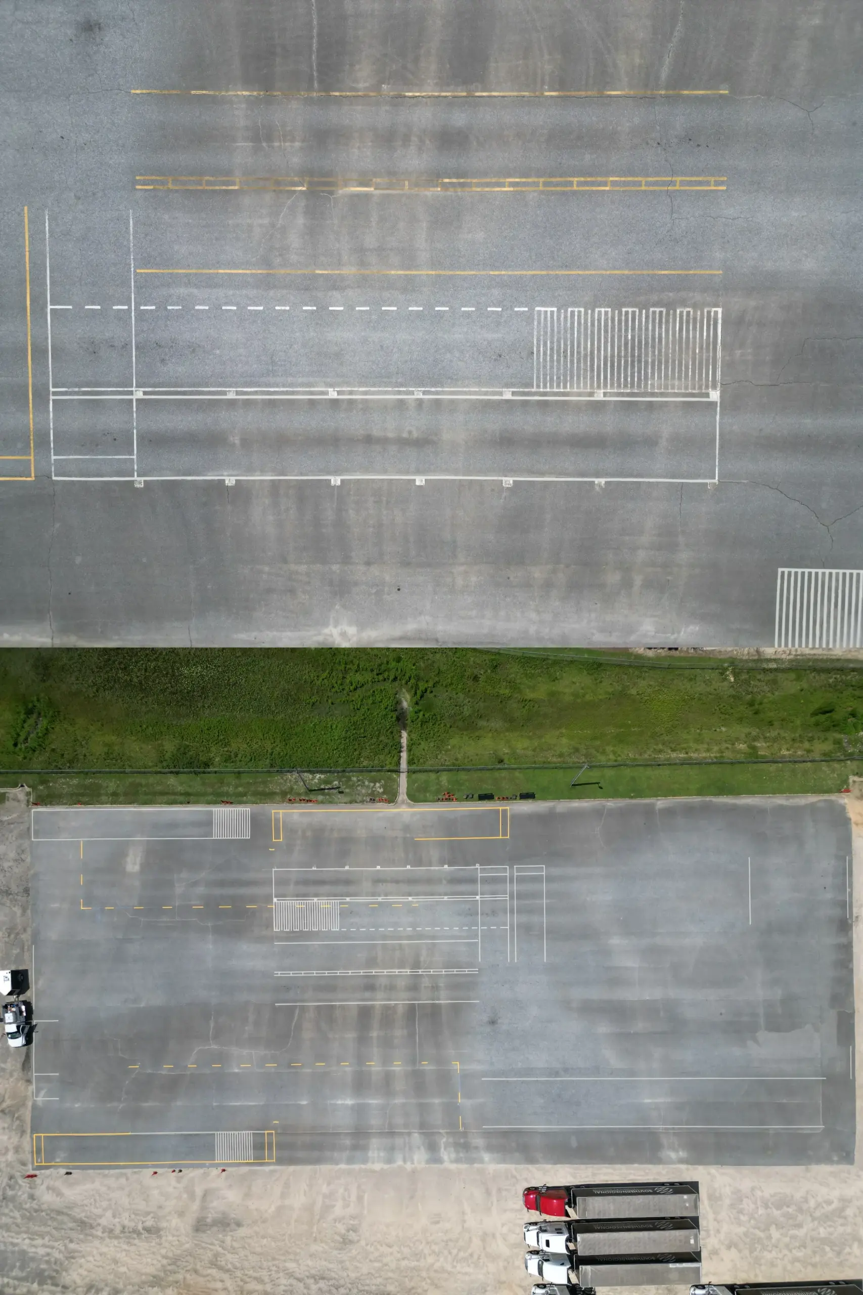 Aerial before and after pavement marking project by Peach State Stripe